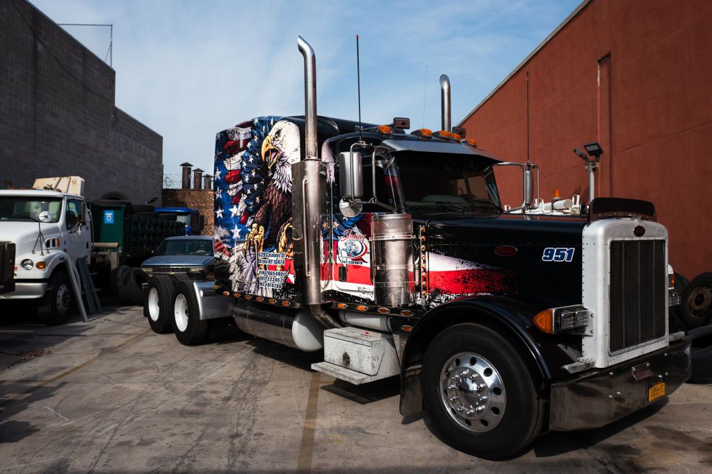 Example of a Semi Truck with patriotic vehicle wraps design
