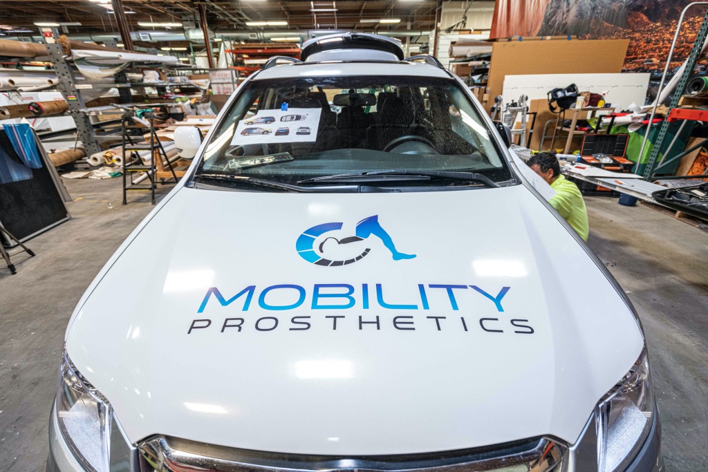 Wrapmate Pro Vision Graphics finished wrapping car for Mobility Prosthetics
