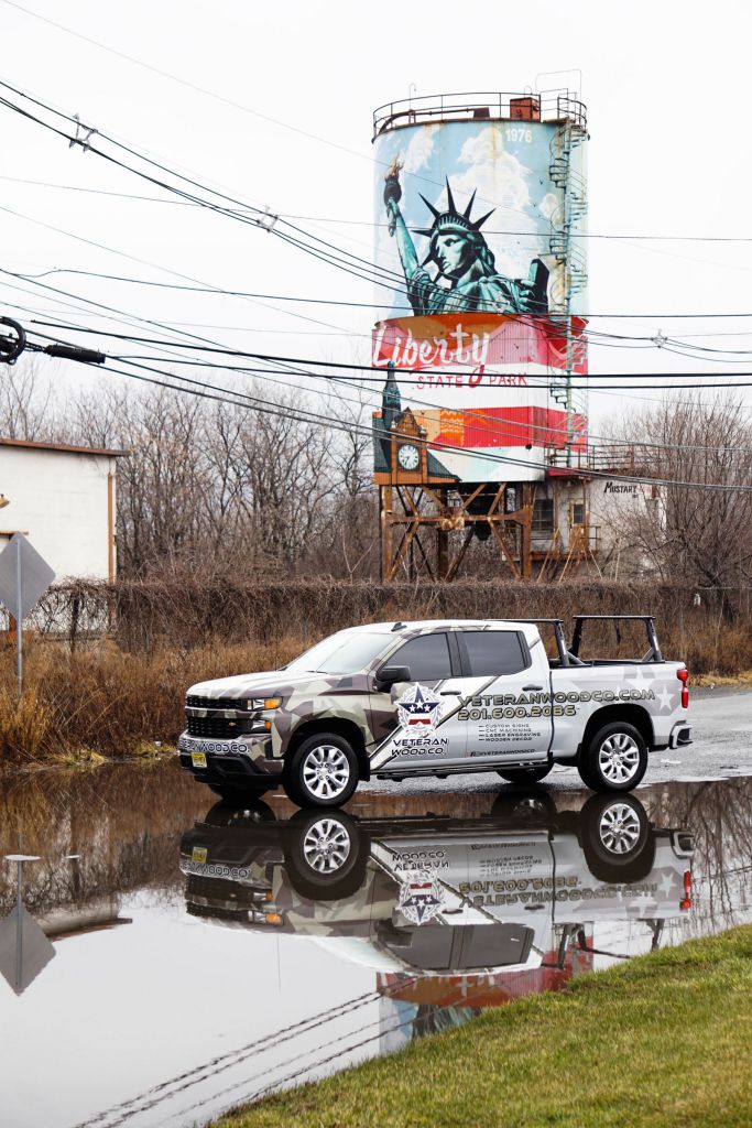 Chevy Silverado Full Truck Wrap with Statue of Liberty in background