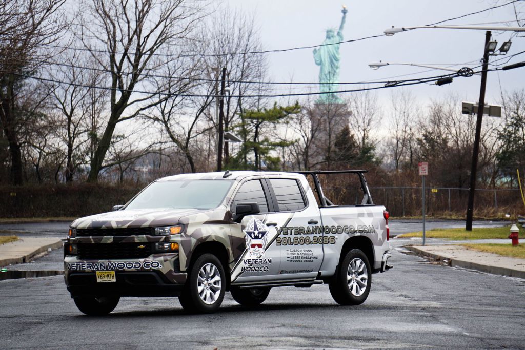 Chevy Silverado Full Truck Wrap with Statue of Liberty in background